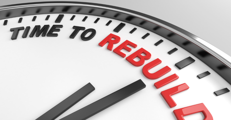 Clock face with words time to rebuild symbolizing how to rebuild confidence after constant job rejections